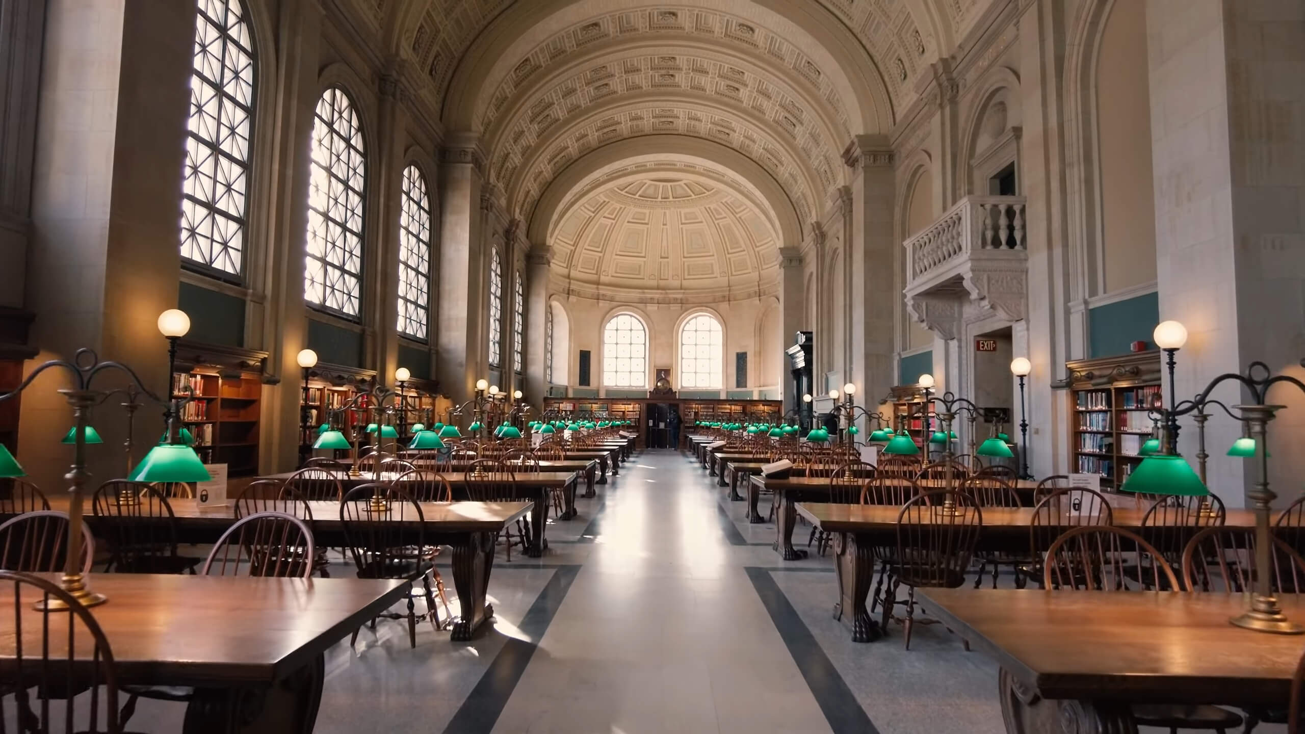 The impressive reading room of the Boston Public Library