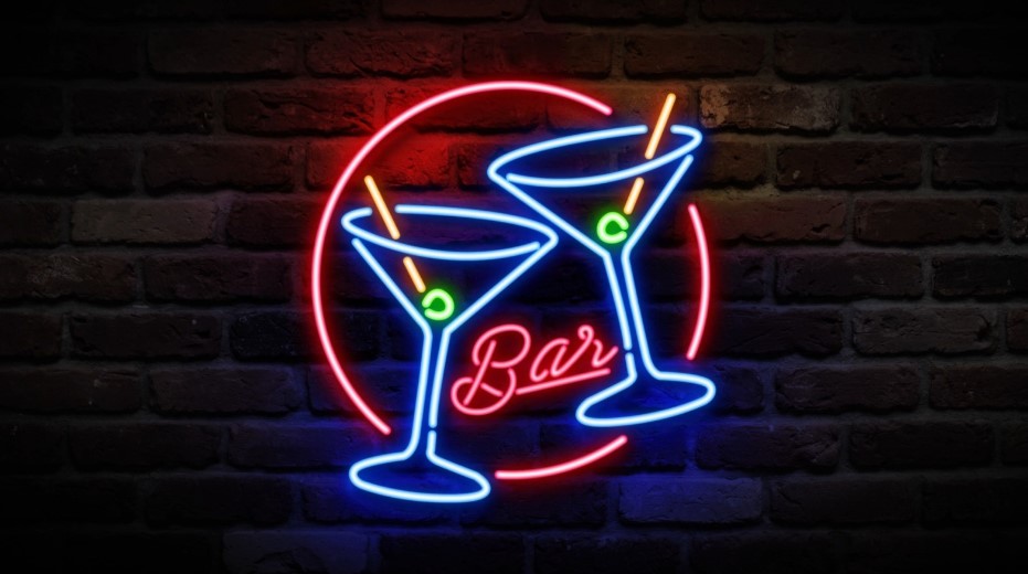 Neon martini glasses and the word "Bar" create a captivating, inviting sign