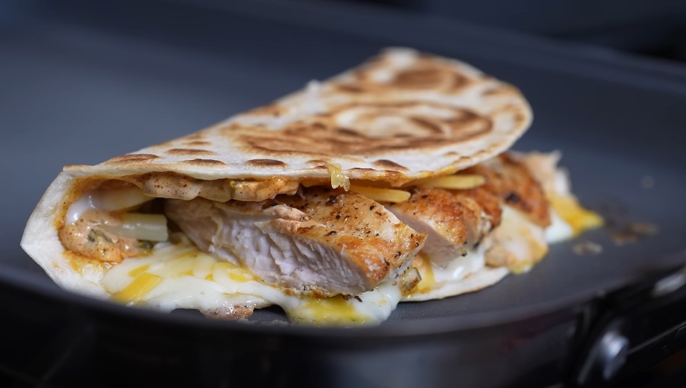 Crispy tortilla, seasoned chicken, and melted cheese create a satisfying quesadilla