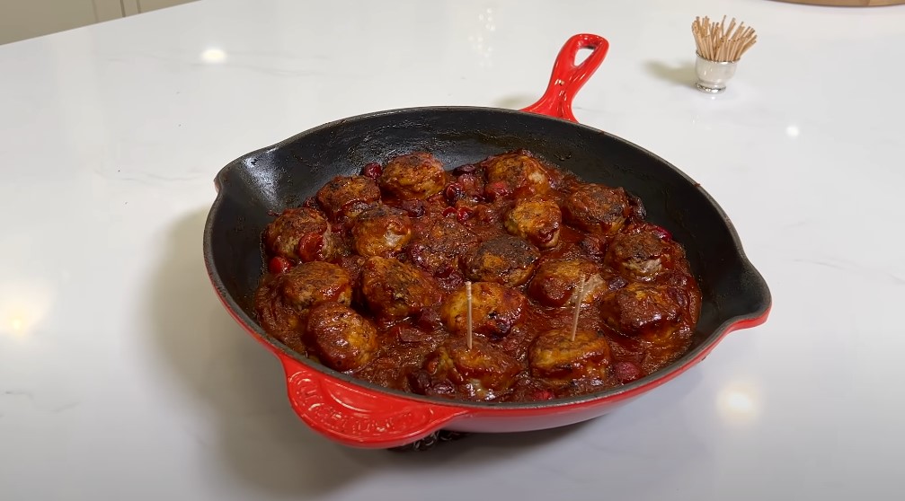 Savory meatballs, bathed in a rich cranberry sauce